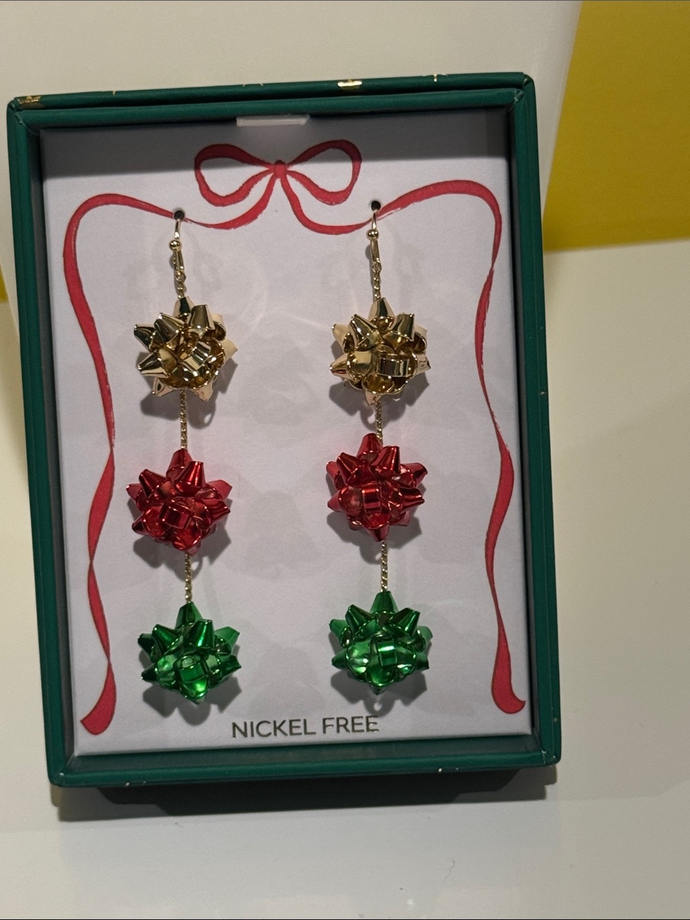 New true to form bow dangle earrings,